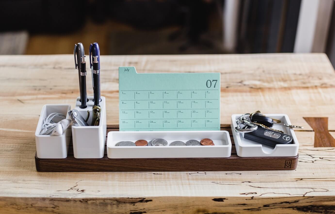 Everyday items on a wooden tray