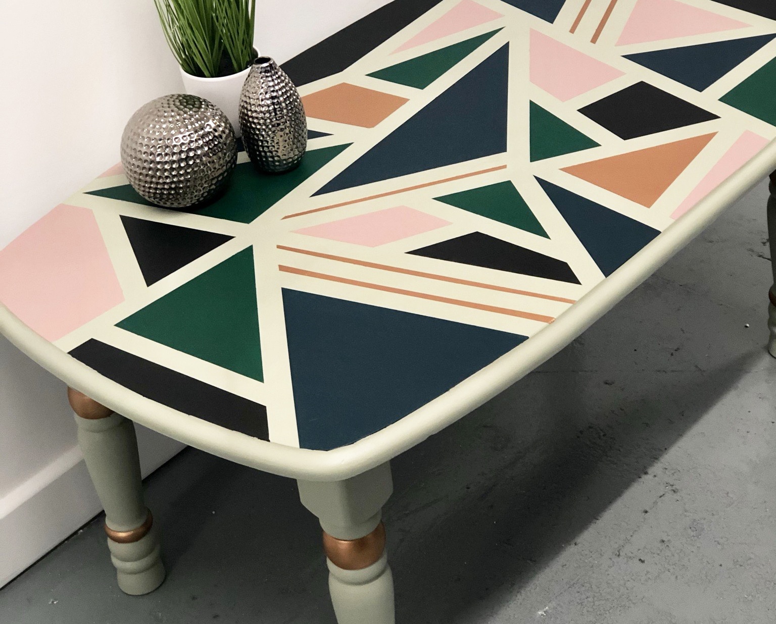 A coffee table with colourful geometric patterns