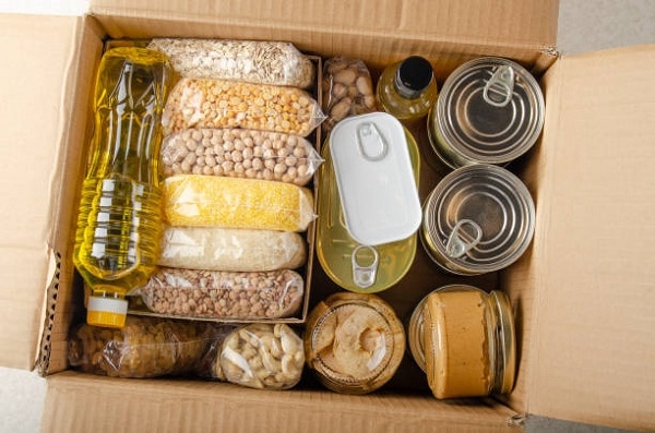 Canned goods in a cardboard box