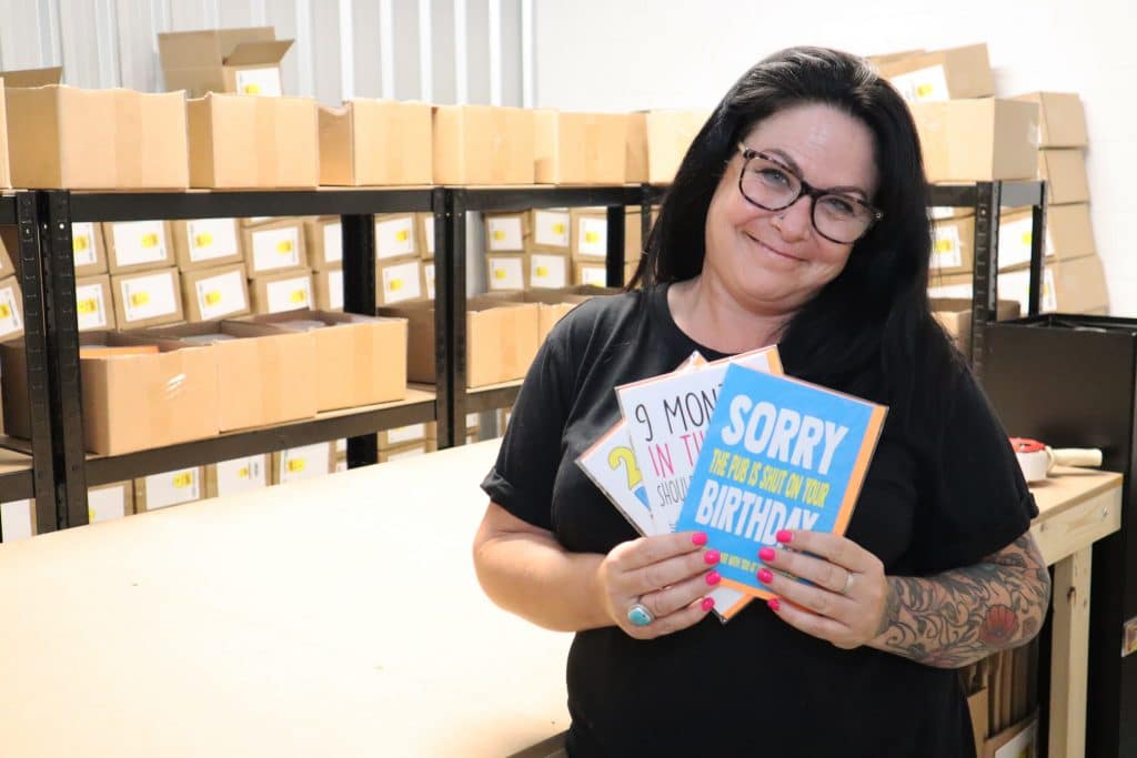 Joanna Cooper from Cheeky Chops Cards in her storage unit at our Huntingdon store