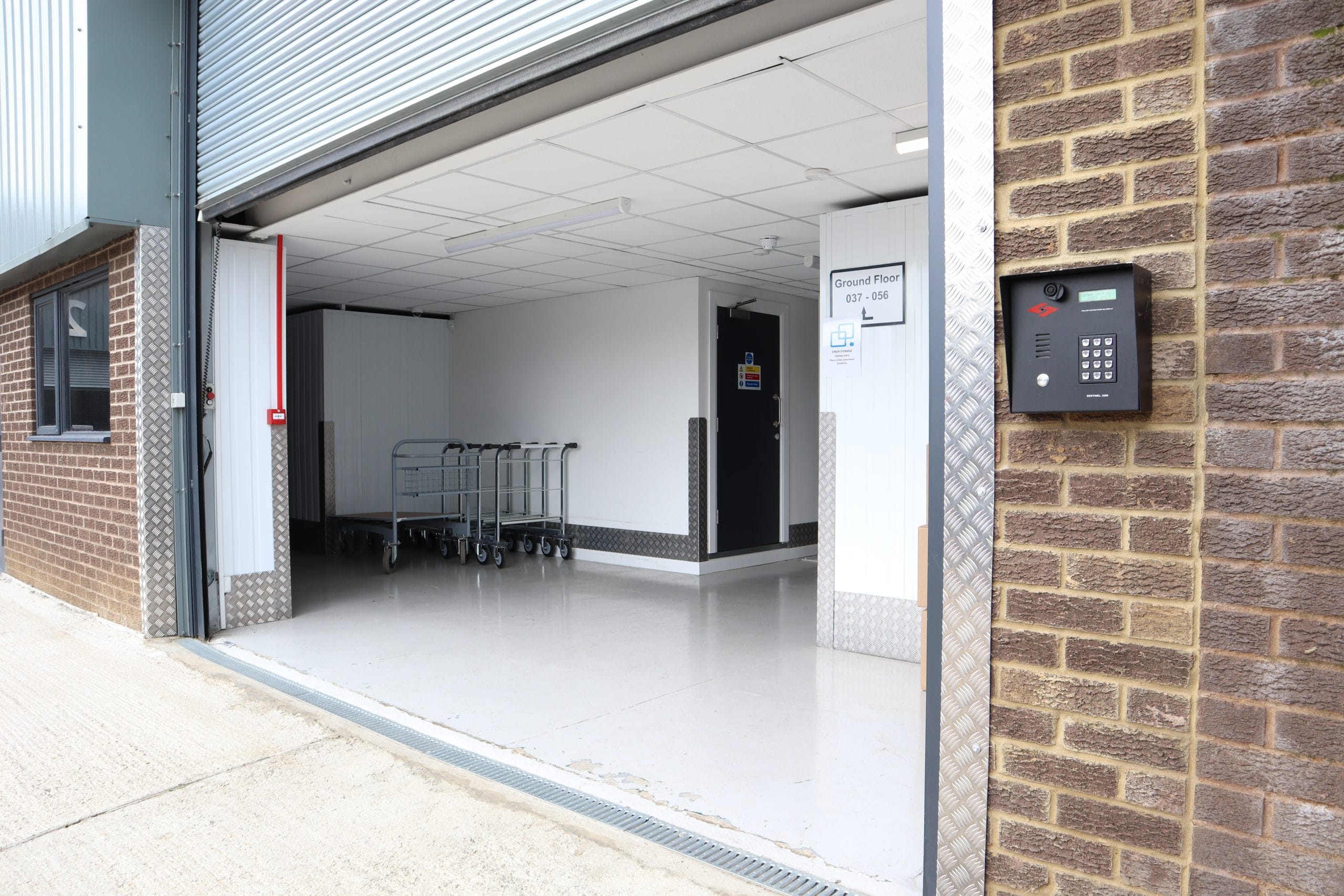 Storage Rooms Brighton interior, rolling door and luggage trolleys