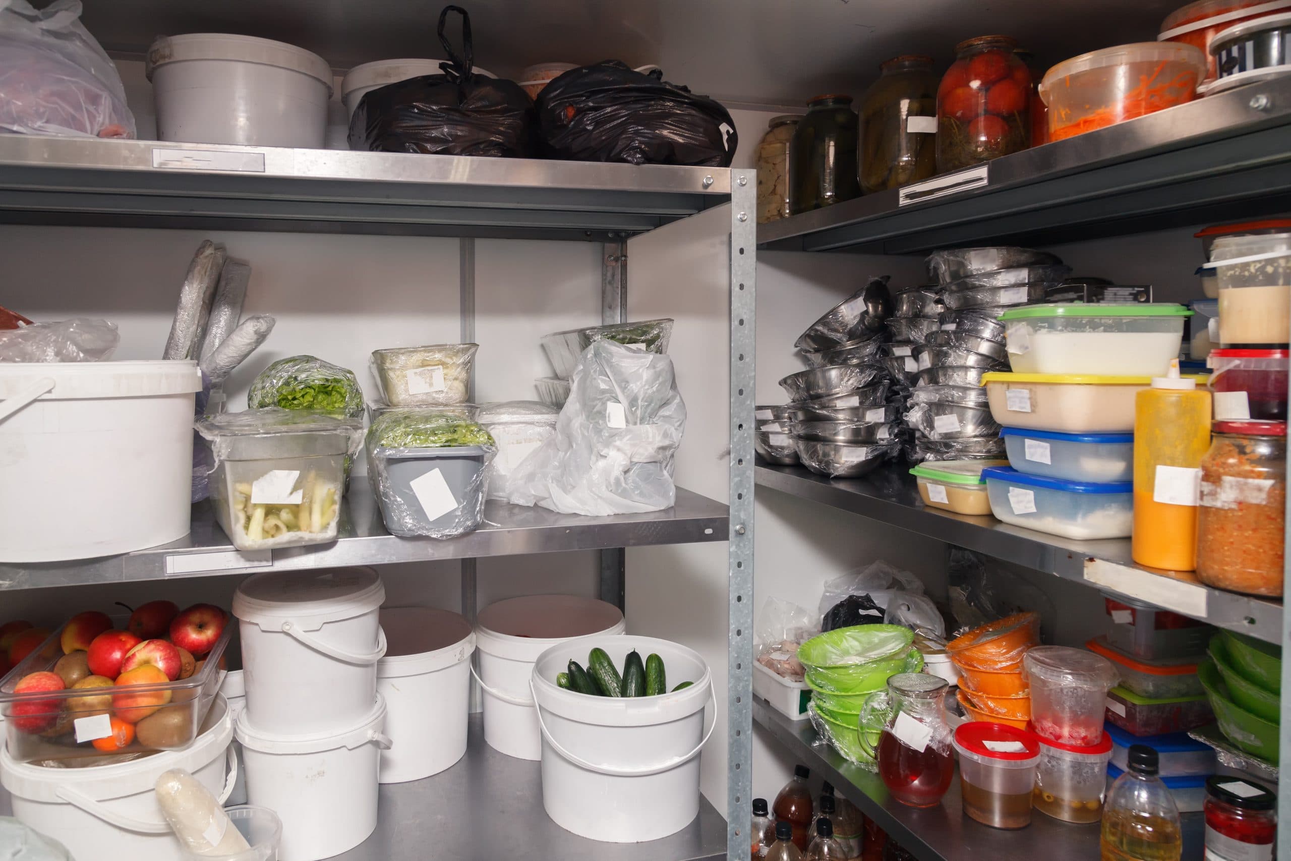 Restaurant self storage featuring different foods in containers on shelving units