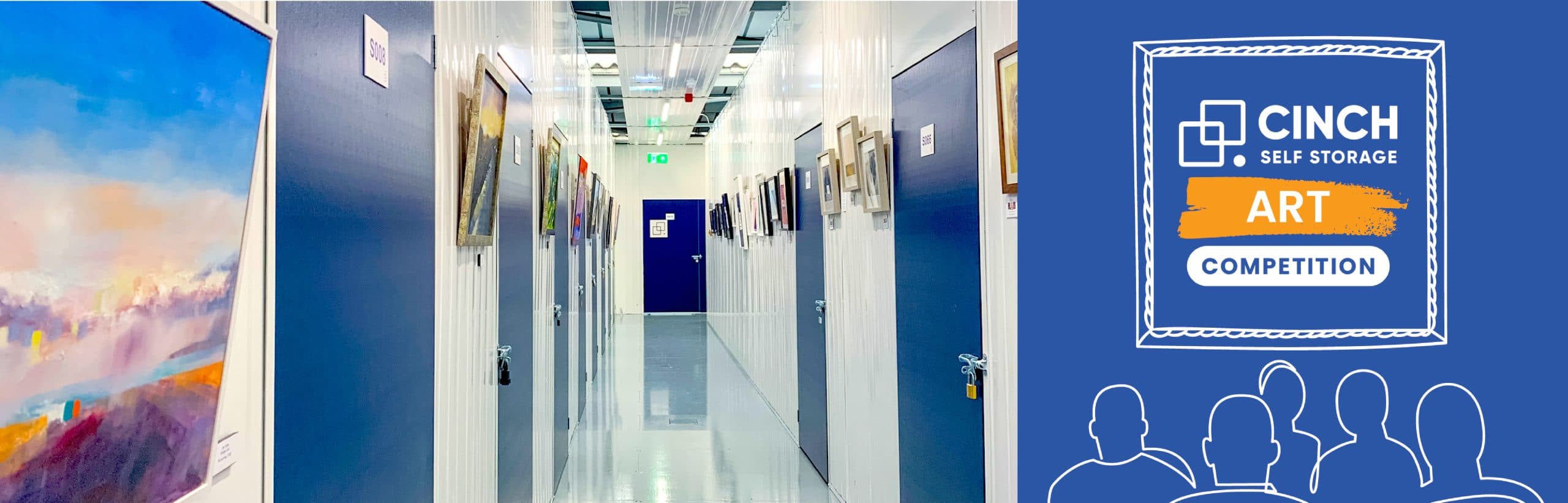 Corridor of storage unit with community art displayed on walls