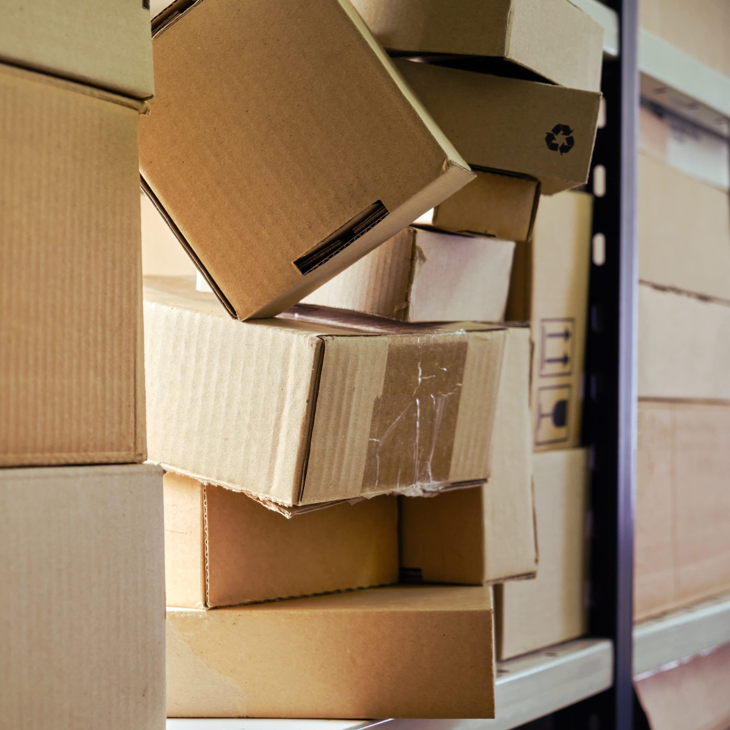 Overflowing boxes on shelving unit in business Storage Huntingdon