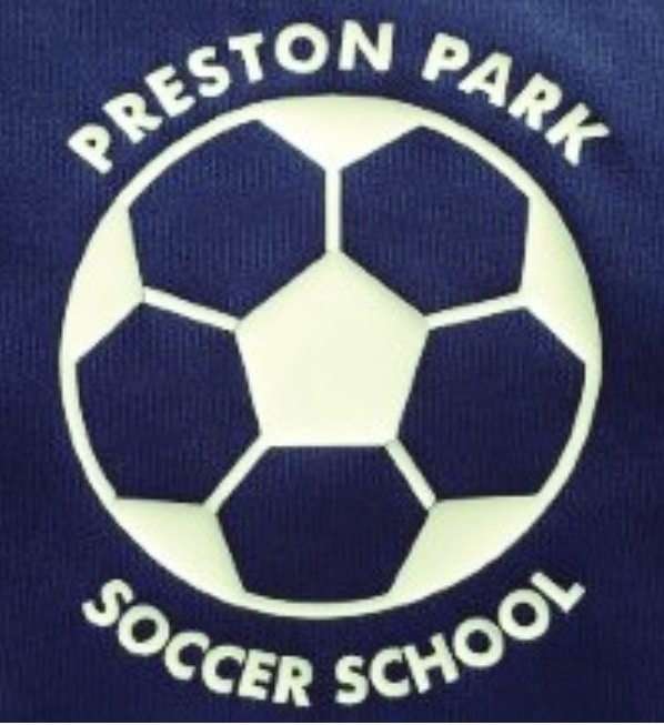 Navy fabric with white football and Preston Park Soccer school in curved text around the ball