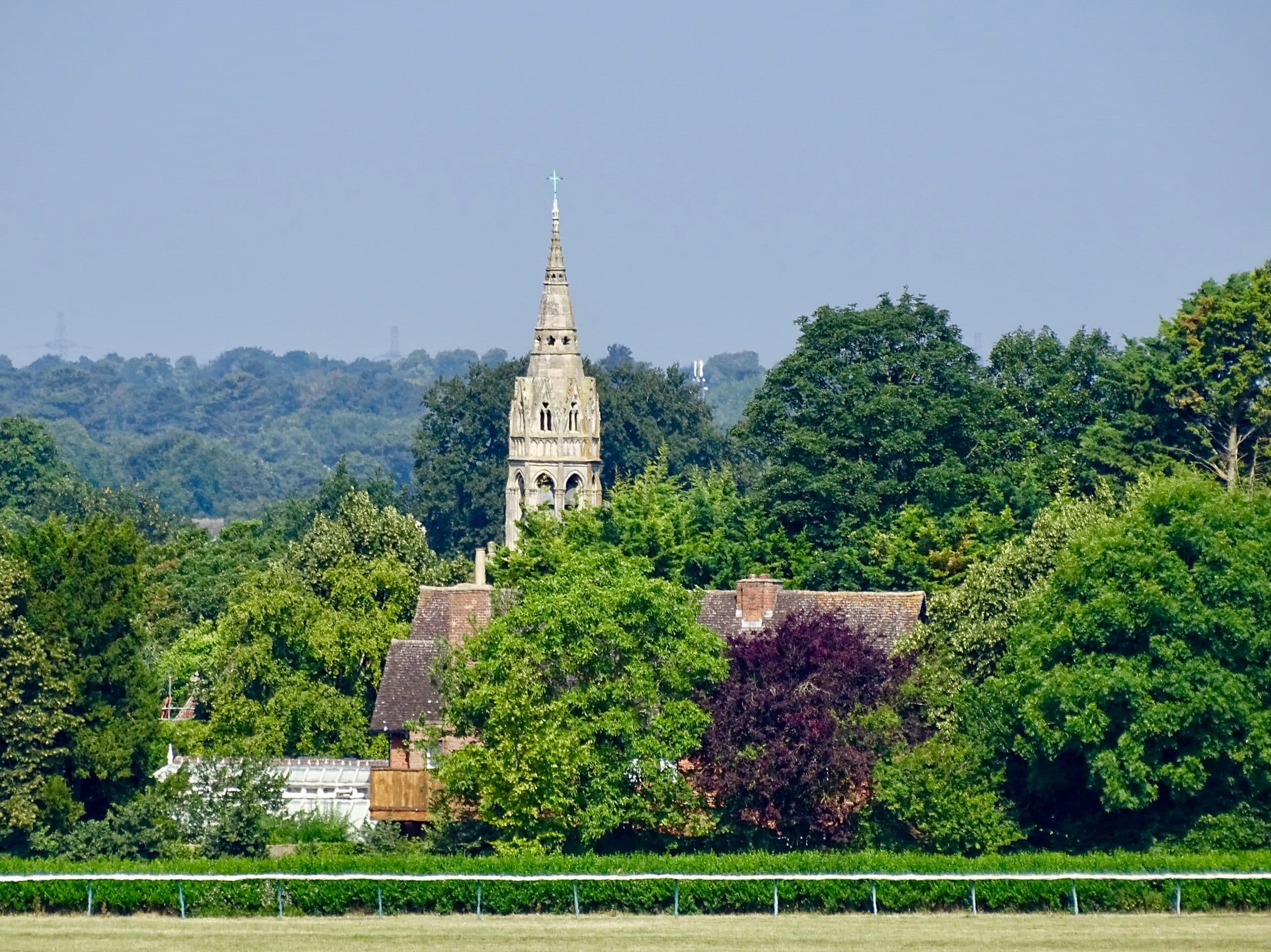 Church and house roofs and trees in Newmarket