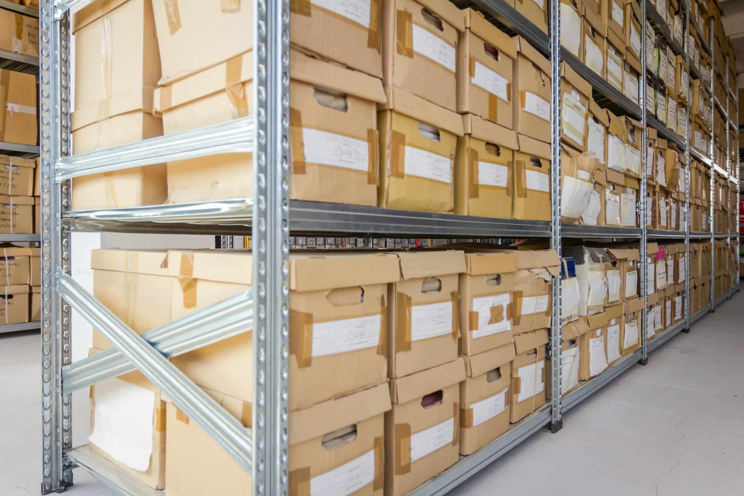 Archive storage boxes stacked on racking in Huntingdon archive storage unit