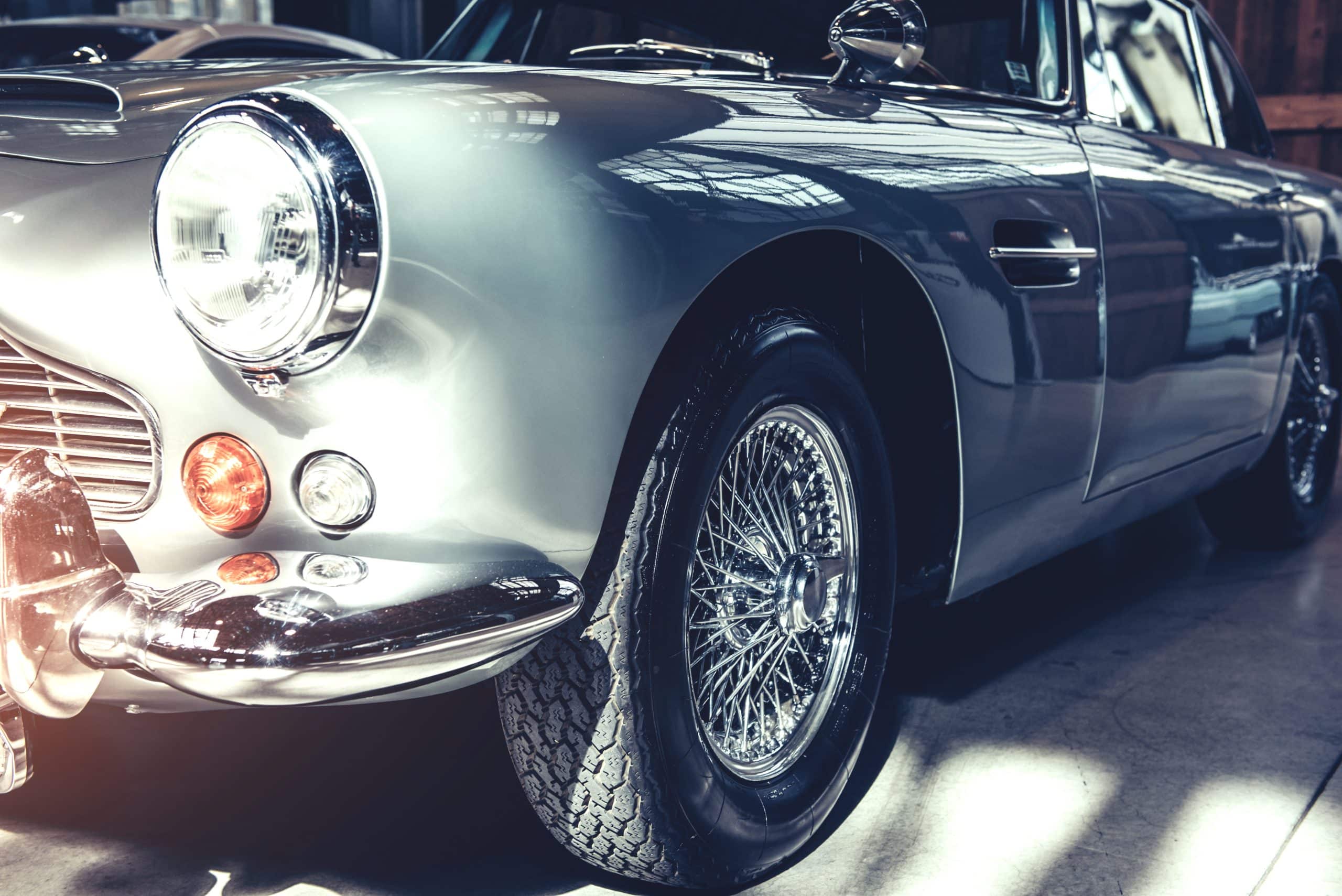 Newbury storage: image shows the headlight and side body of a grey classic car