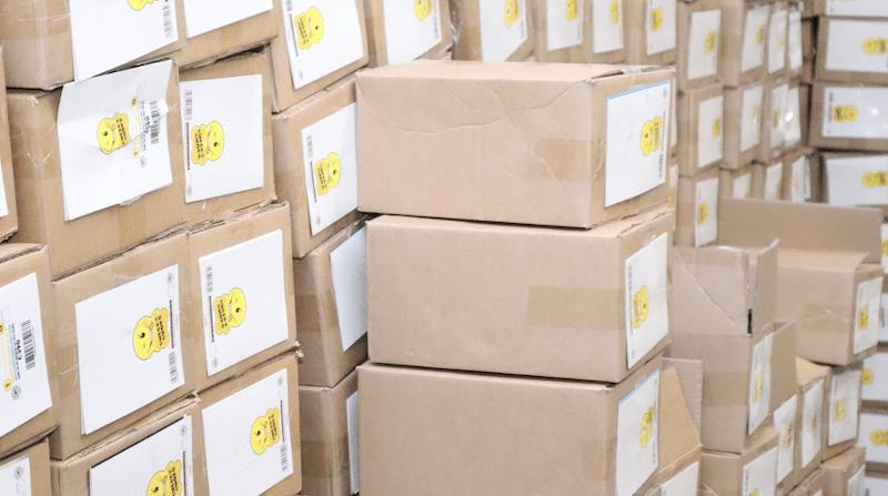 Business storage in Southend. Image shows stacked boxes filled with stock in storage unit. 