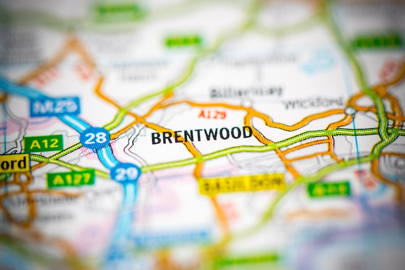 Things to do in Brentwood. Image shows a blurred out map with Brentwood in the centre in black writing.